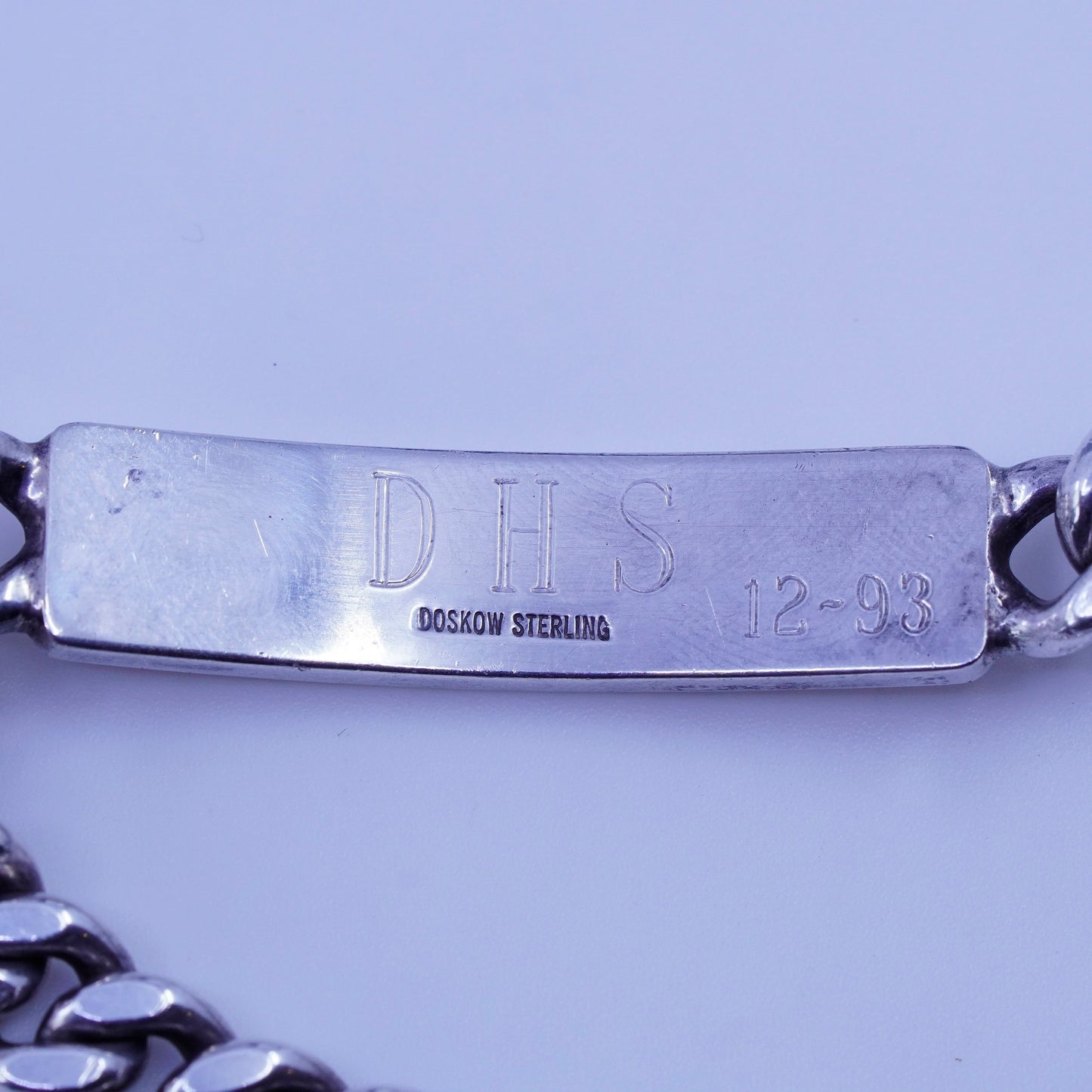 7.5”, doskow Sterling silver bracelet, 925 curb chain name tag engraved “FES”