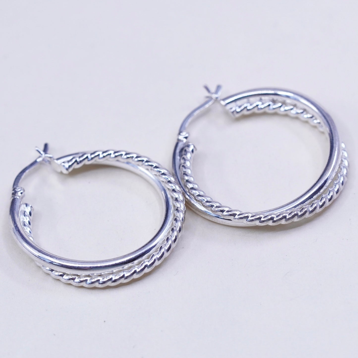 1.25”, Vintage sterling silver loop earrings, entwined twisted primitive hoops