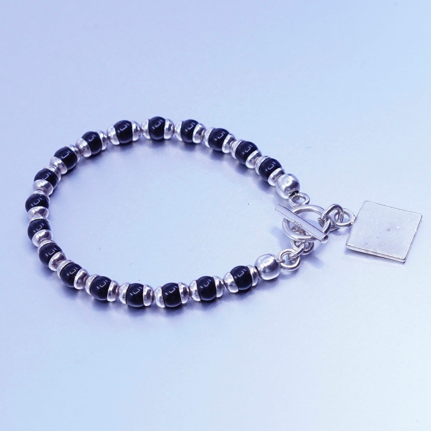 6.75”, vintage Sterling 925 silver bracelet obsidian beads and square tag charm