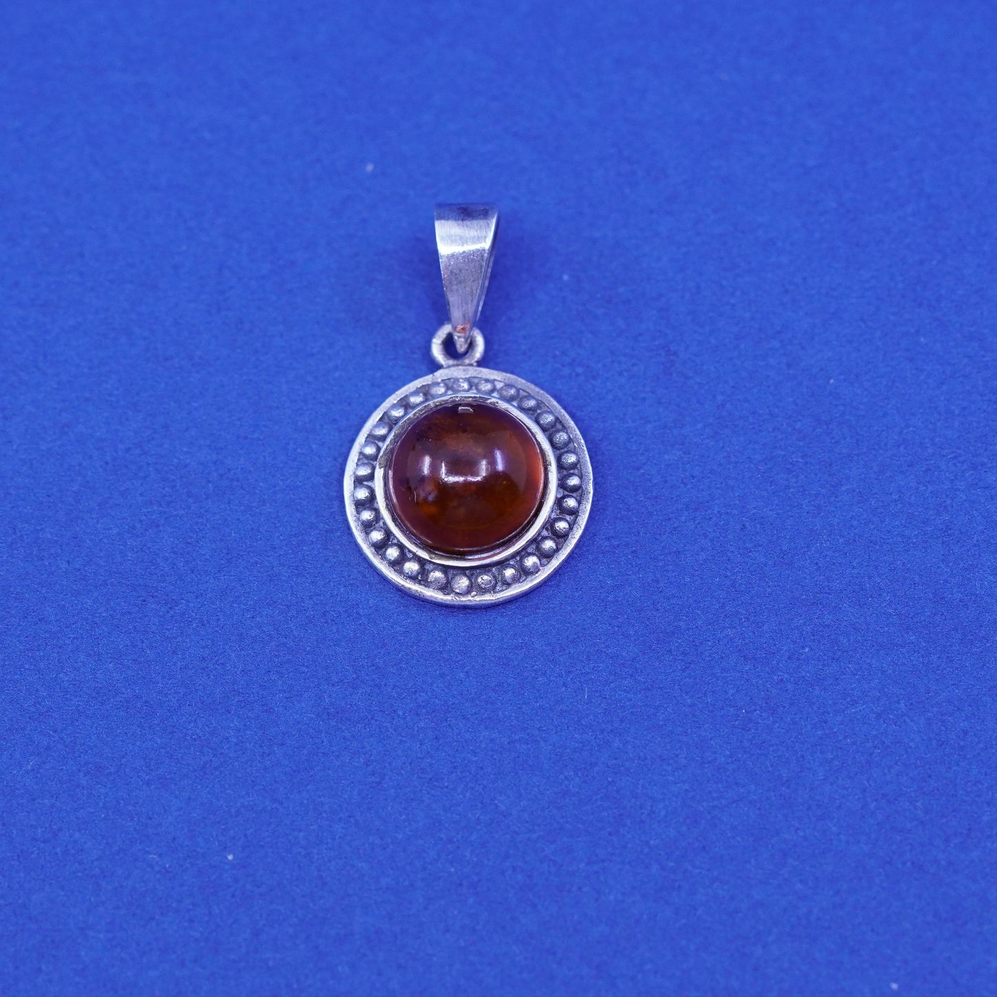 Vintage Sterling 925 silver handmade pendant with honey amber and beads around