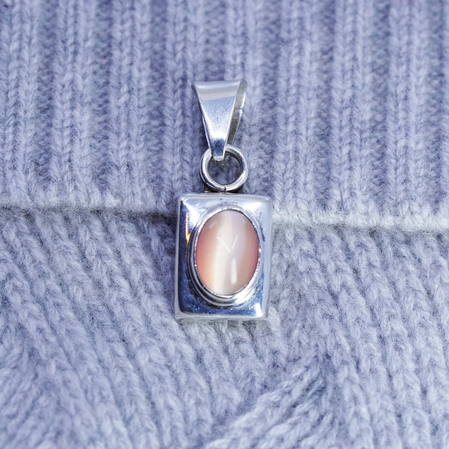 Vintage sterling 925 silver handmade pendant with oval orange cat’s eye