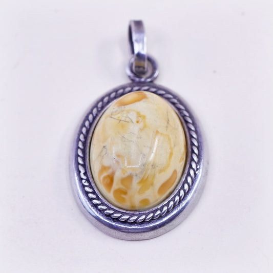 Vintage sterling 925 silver handmade pendant with oval amber