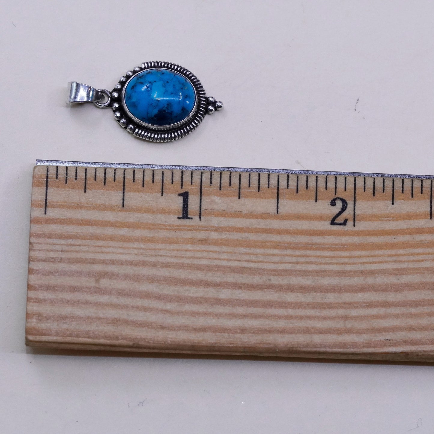 vtg Sterling silver handmade pendant with oval kingman spiderwebbed turquoise