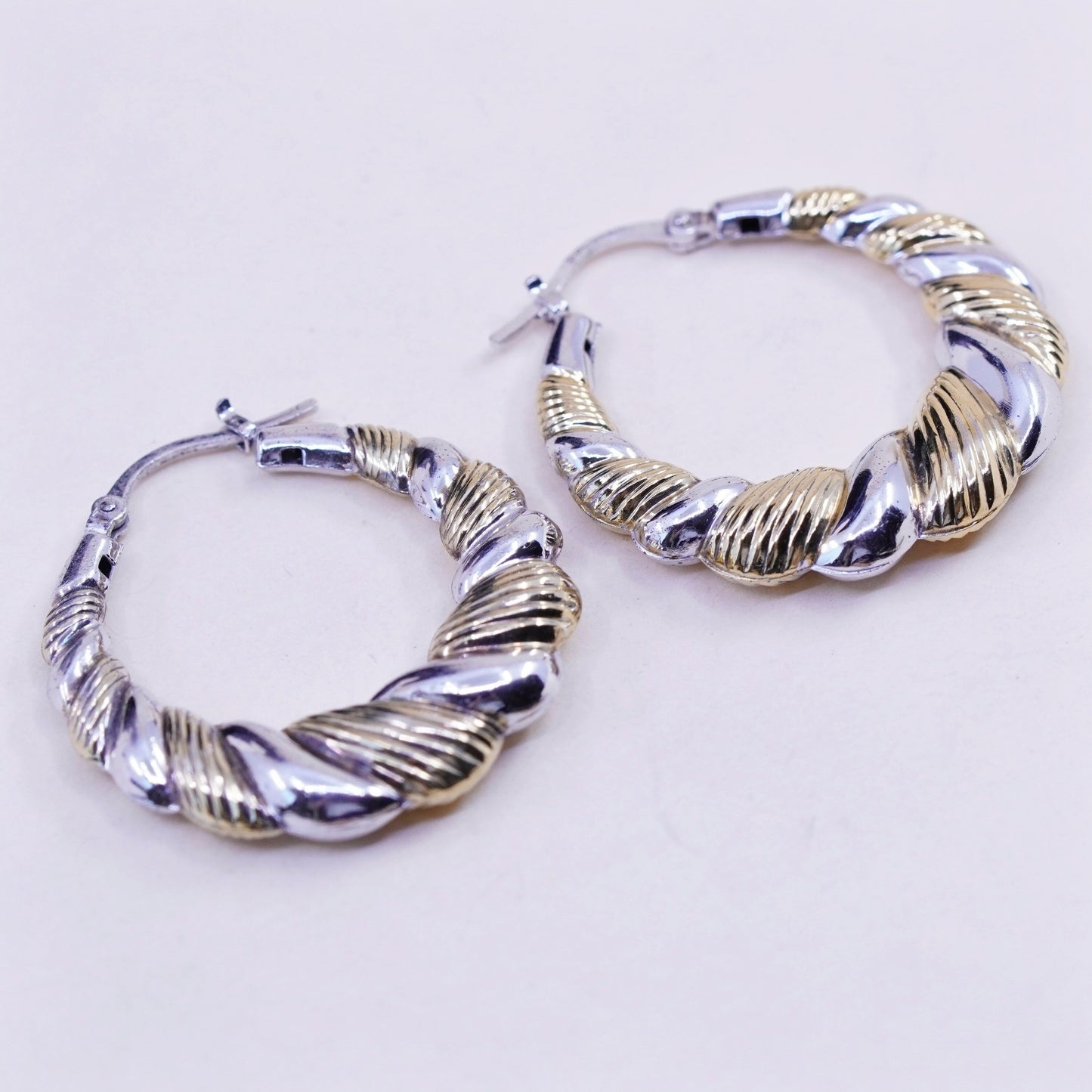 1.25”, two tone sterling silver loop earrings, Ribbed twisted hoops, huggie