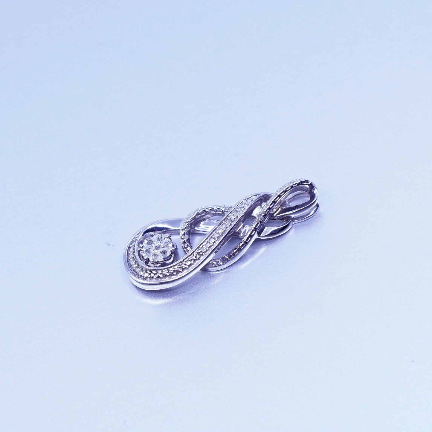 Vintage sterling 925 silver pendant, entwined teardrop with diamond