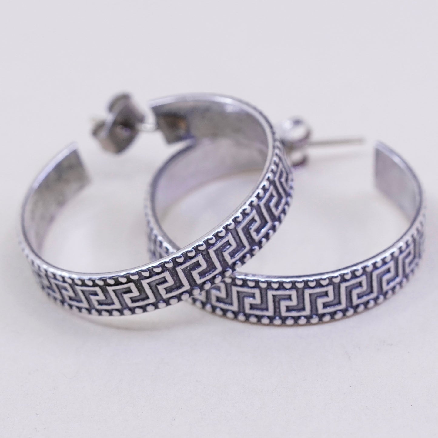 1.25”, sterling silver handmade earrings, Greek key primitive Huggie hoops