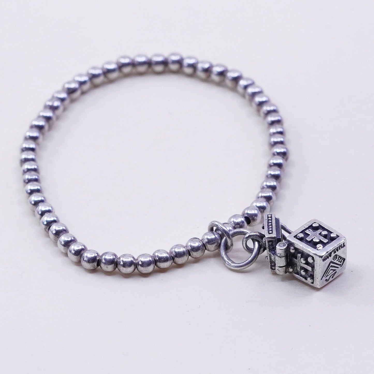 5.25”, sterling silver elastic bracelet, 925 beads and prayer locket charm