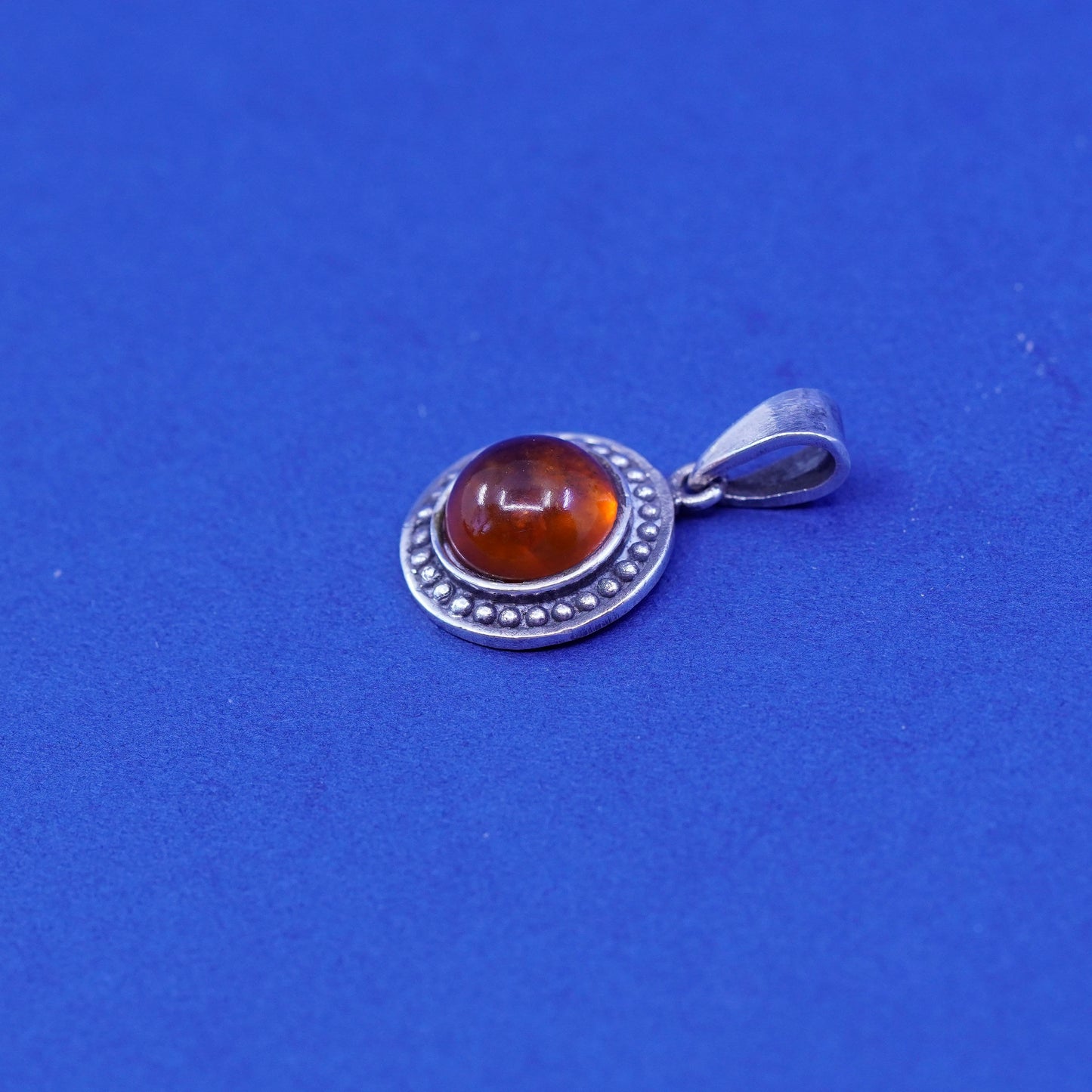 Vintage Sterling 925 silver handmade pendant with honey amber and beads around