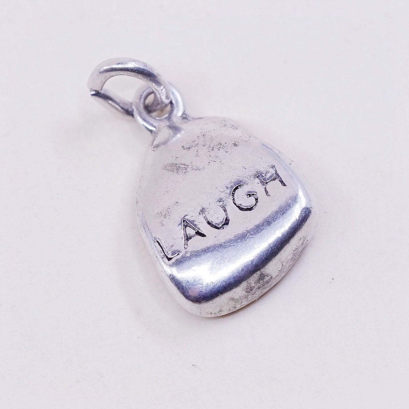 Vintage DV sterling silver Nugget charm, 925 pendant with “laugh” embossed