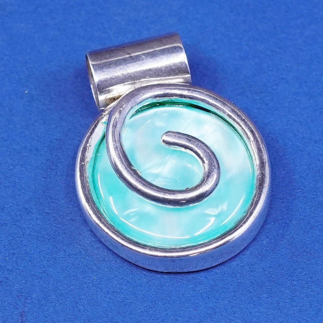 vtg Sterling silver handmade charm, 925 pendant w/ round green plastic N swirl