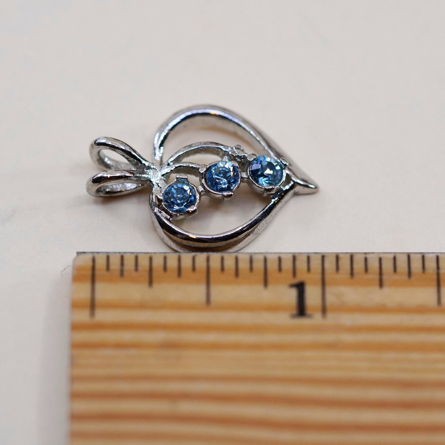 Vintage Sterling silver heart pendant with blue crystal