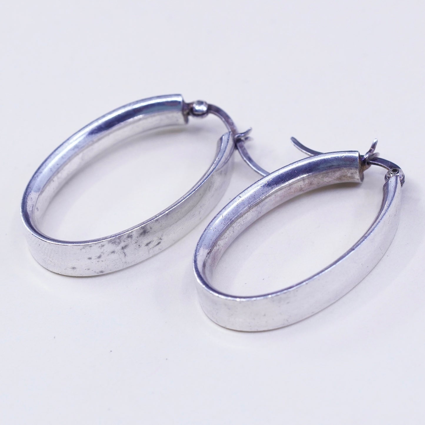 1.25” Vintage sterling silver oval earrings, minimalist primitive Huggie hoops