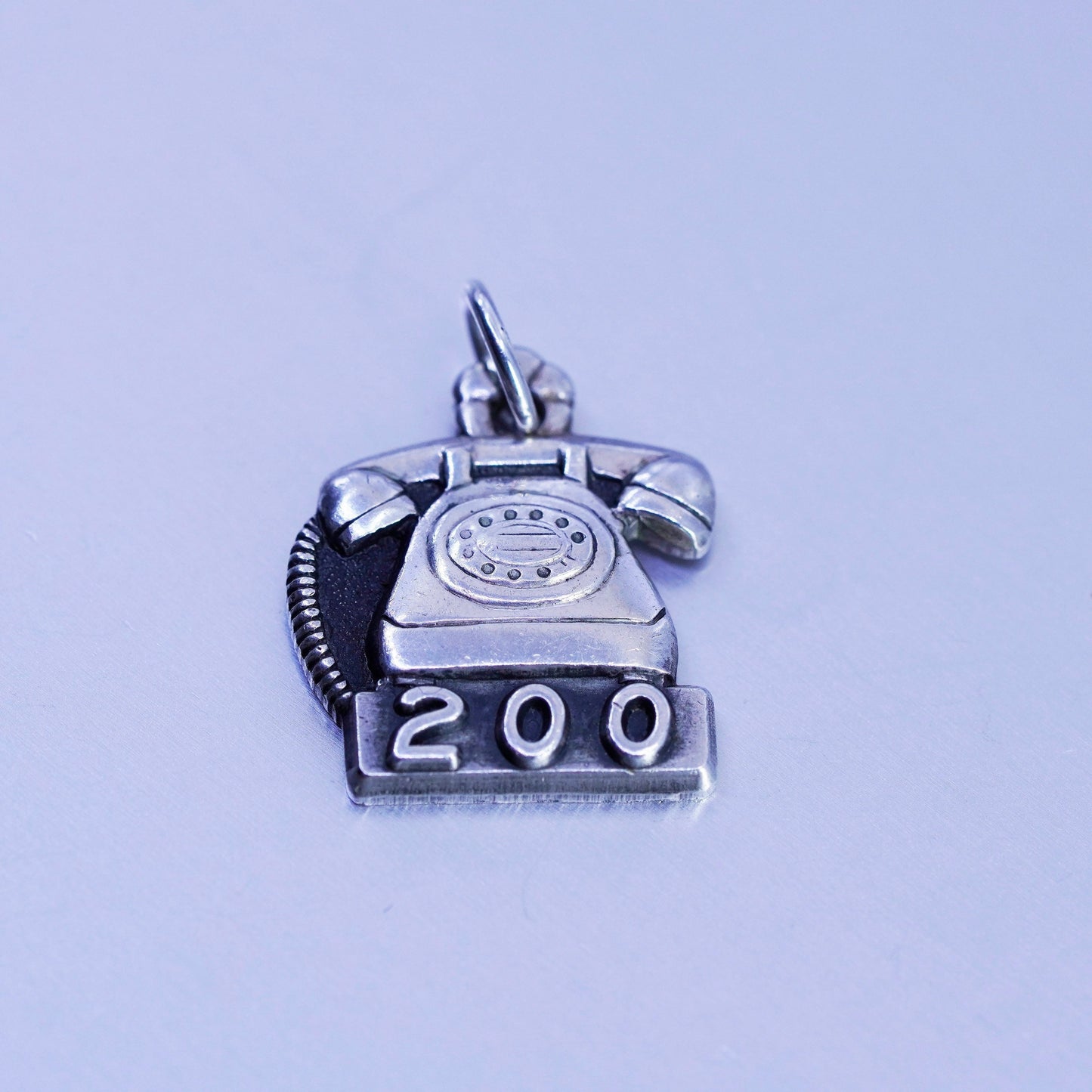 Antique Sterling silver handmade charm, 925 old fashion telephone embossed “200