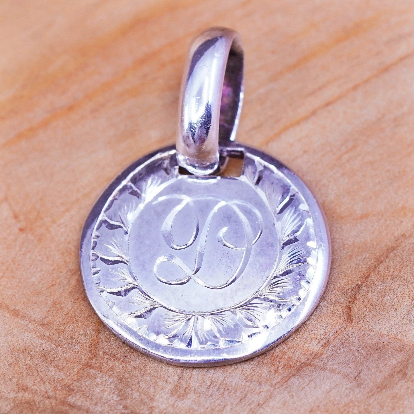 Sterling silver initial pendant, 925 round tag engraved initial D “Xmas 2010”