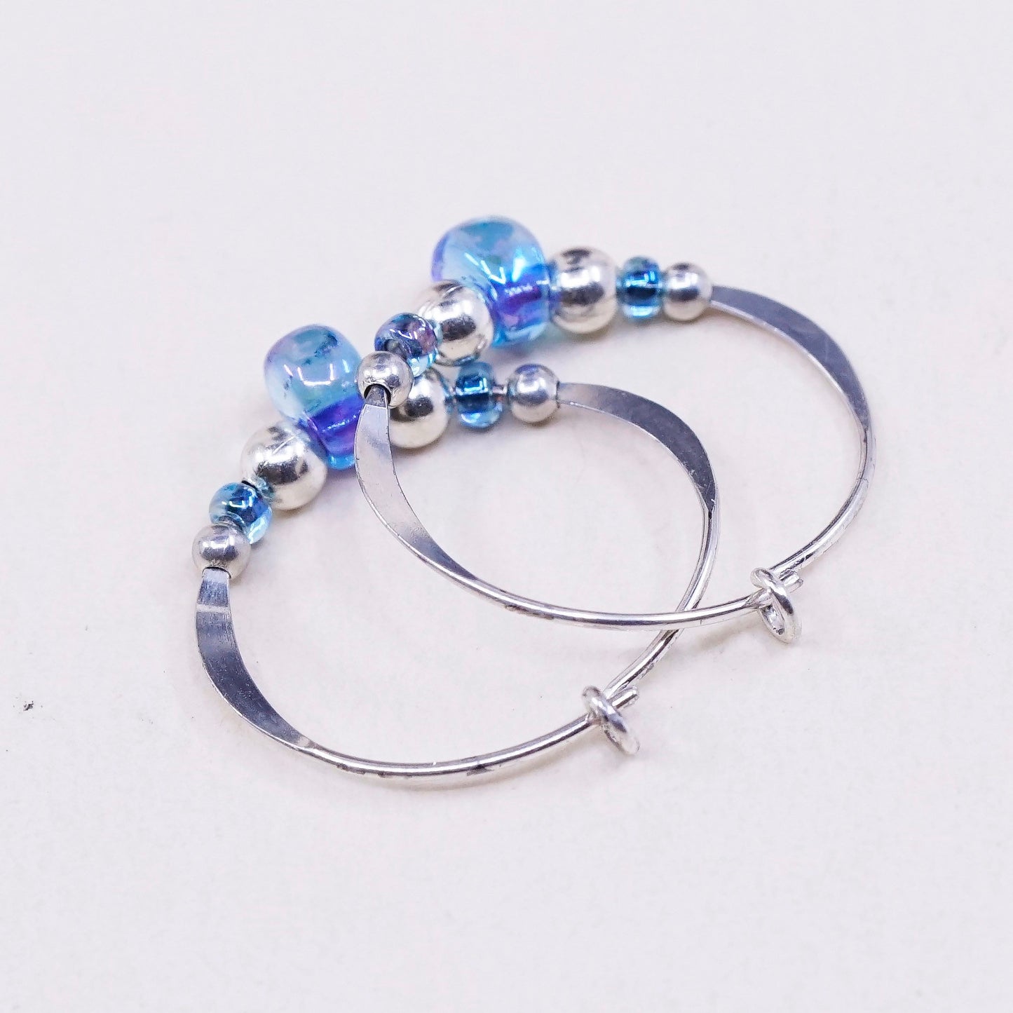 0.5”, vtg sterling silver loop earrings, minimalist primitive hoops w/ blue cz