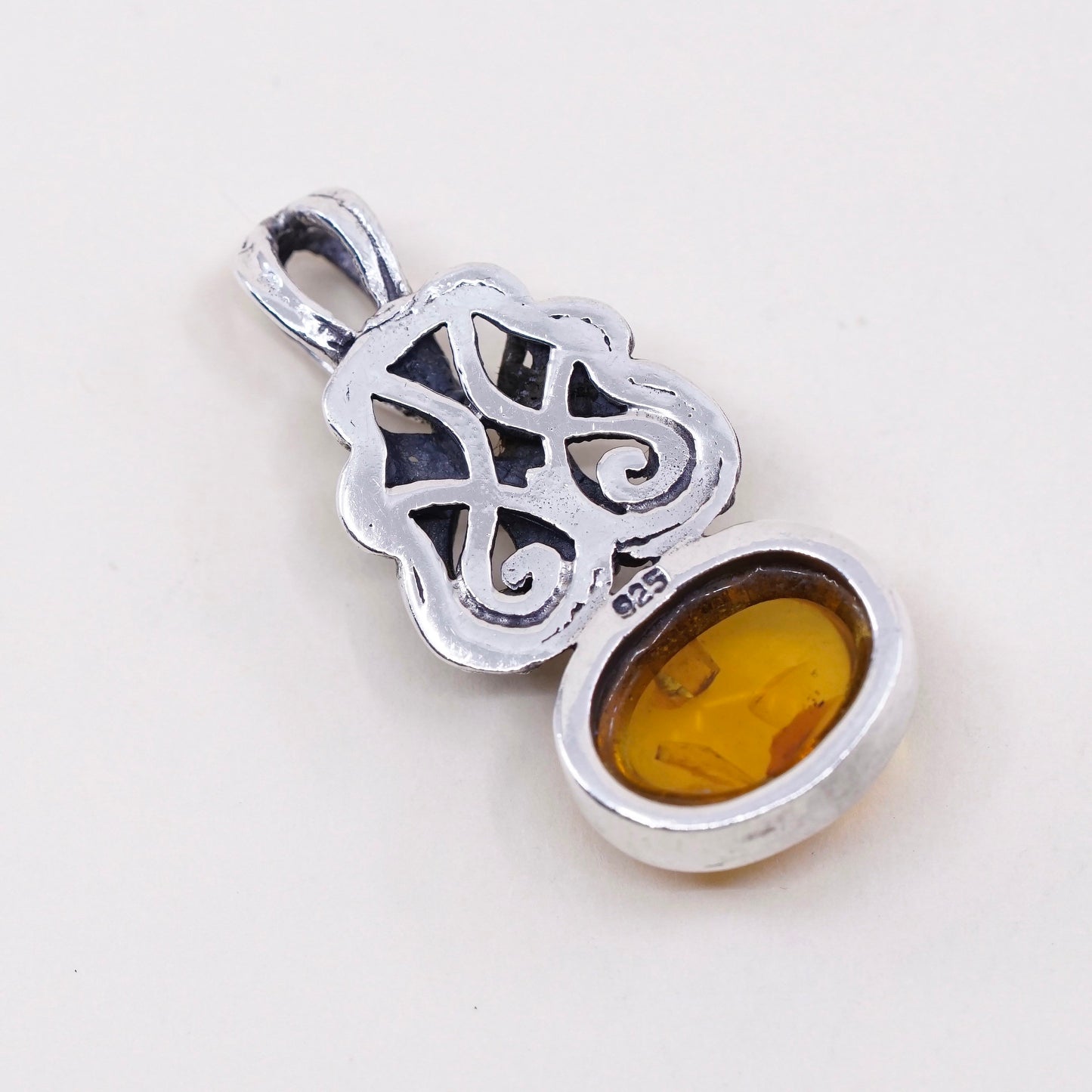 Vintage sterling 925 silver handmade pendant with oval amber and beads around
