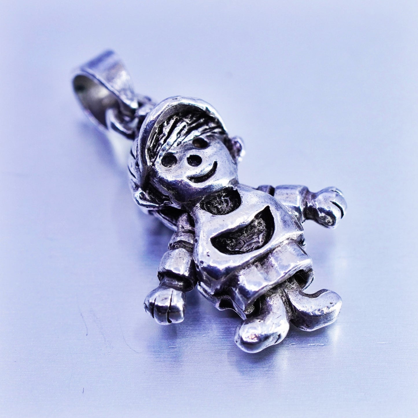 Antique Sterling silver handmade, 925 boy charm with movable arms and legs