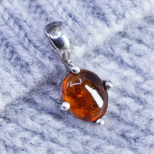 Vintage sterling 925 silver handmade pendant with oval amber